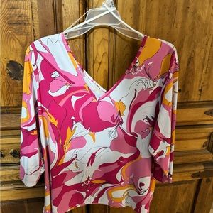 Venezia pink, orange, and white accented blouse. V-cut.